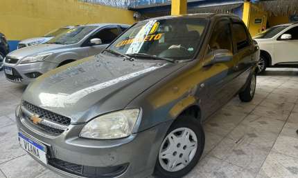 Gm classic 1.0 vhc-e - direção h. + ar condicionado