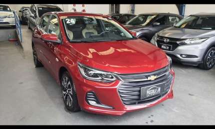 Onix hatch premier 1.0 turbo automático