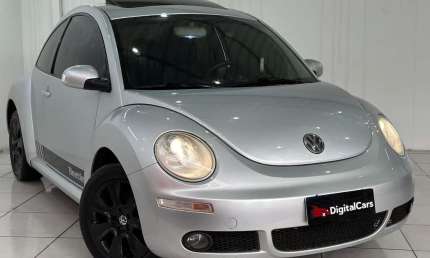 Volkswagen new beetle 2.0 mi 8v mec. 2009