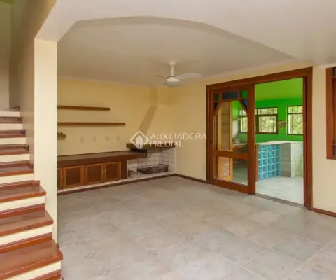 Casa com 3 quartos à venda na Rua Augusto Lourenço Martins, 110, Vila Nova, Porto Alegre