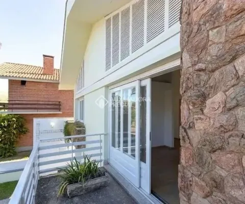 Casa com 3 quartos à venda na Rua Manauê, 76, Vila Assunção, Porto Alegre