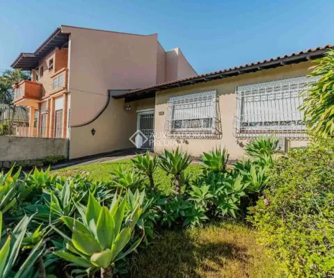 Casa com 3 quartos à venda na Rua Curupaiti, 806, Cristal, Porto Alegre