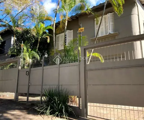 Casa em condomínio fechado com 4 quartos à venda na Rua Eudoro Berlink, 222, Auxiliadora, Porto Alegre