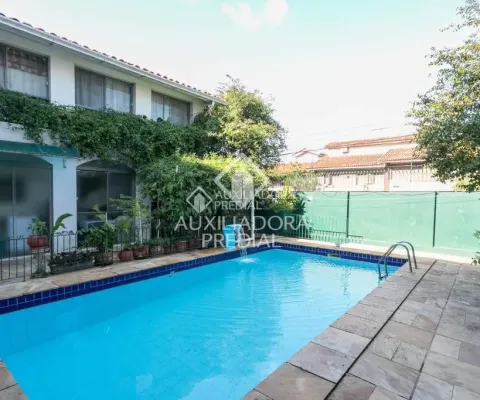 Casa com 4 quartos à venda na Rua José Antônio Aranha, 324, Três Figueiras, Porto Alegre
