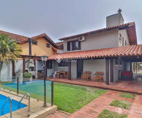 Casa com 3 quartos à venda na Rua Engenheiro Tito Marques Fernandes, 85, Ipanema, Porto Alegre