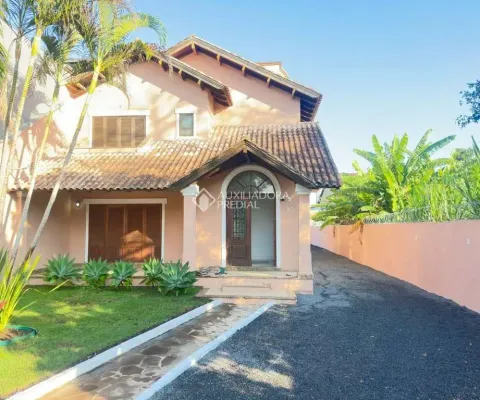 Casa com 5 quartos à venda na Rua Atílio Supertti, 87, Vila Nova, Porto Alegre