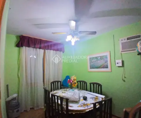 Casa com 3 quartos à venda na Avenida Deputado Aramy Silva, 166, Santa Tereza, Porto Alegre