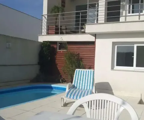 Casa em condomínio fechado com 4 quartos à venda na Rua Adriano Pereira da Silva, 290, Vila Nova, Porto Alegre