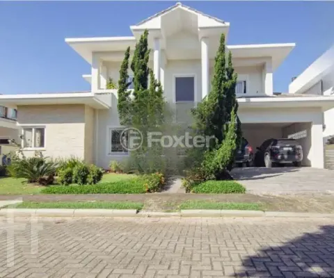 Casa em condomínio fechado com 4 quartos à venda na Rodovia Doutor Antônio Luiz Moura Gonzaga, 3825, Rio Tavares, Florianópolis