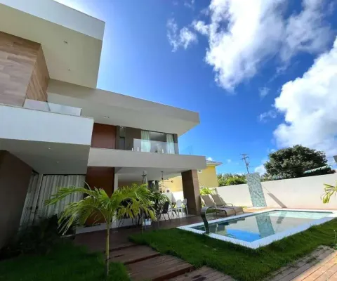 Luxuosa casa em condomínio à venda em guarajuba, camaçari-ba: 5 quartos, 5 suítes, 1 sala, 6 banheiros, 4 vagas de garagem, 250m².