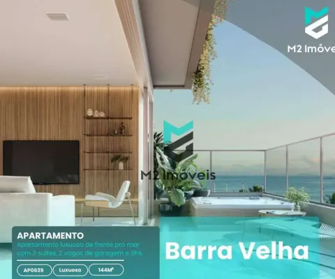 Apartamento boutique frente mar com 3 suítes e spa na sacada.