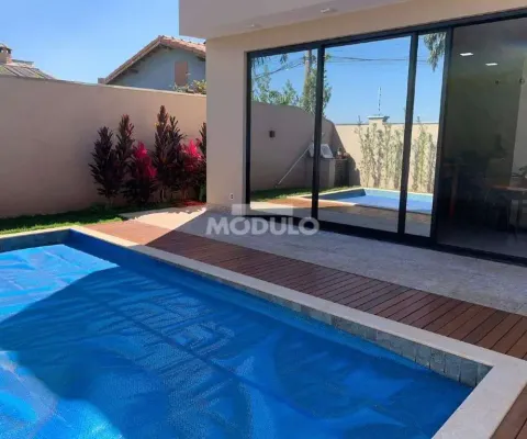 Casa residencial em condomínio para locação, bairro shopping park com 3 suítes