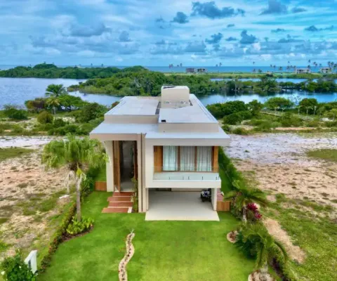 Casa a venda em alphaville guarajuba com 6 suites mobiliada vista lagoa e mar