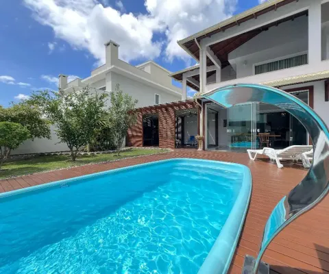 L# casa com 3 dormitorios de 2 suites mobilada com piscina e área gourmet