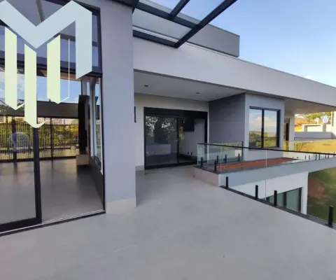 Casa á venda condomínio portal da serra com 04 suítes, escritório, toda automatizada ,vista para o vale, acabamento impecável.
