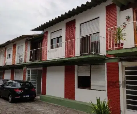 Casa em condomínio fechado com 3 quartos à venda na Rua Jataí, --, Cristal, Porto Alegre