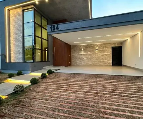 Casa térrea com 3 suítes, 4 vagas, salas integradas, área gourmet, piscina no condomínio splêndido em uberlândia, zona sul.
