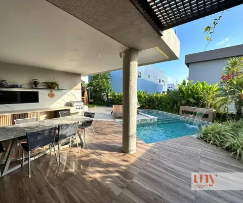 Casa luxuosa com 4 suítes e área de lazer privativa em condomínio fechado no bairro de intermares