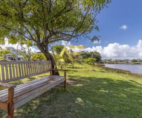 Lote em frente ao lago no condomínio melício machado, aruana (15x30 m²).