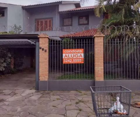 Casa com 3 dormitórios para alugar, 200 m² por R$ 8.271,57/mês - Aberta dos Morros - Porto Alegre/RS