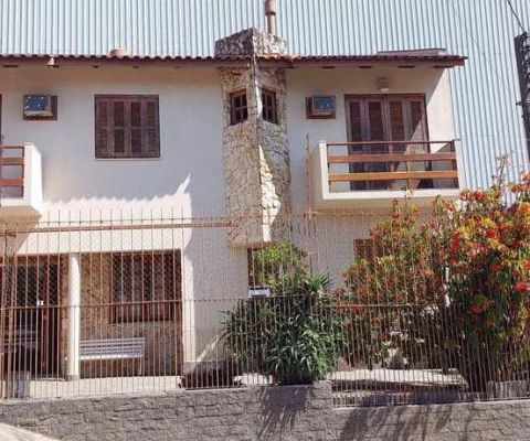 Casa com 4 dormitórios para alugar, 189 m² por R$ 6.900,00/mês - Cavalhada - Porto Alegre/RS