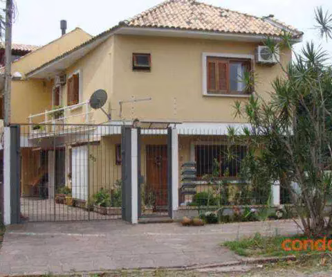 Casa com 3 dormitórios para alugar, 165 m² por R$ 5.292,01 - Ipanema - Porto Alegre/RS