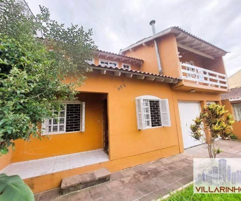 Casa com 4 dormitórios para alugar, 120 m² por R$ 3.490,02/mês - Cavalhada - Porto Alegre/RS