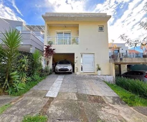 Casa Condominio em Porto Alegre, no bairro Vila Nova, com 3 dormitório(s), e 3 banheiros, à venda.