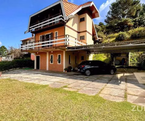 Casa com 3 dormitórios à venda, 161 m² por R$ 1.200.000,00 - Nova Suíça - Campos do Jordão/SP