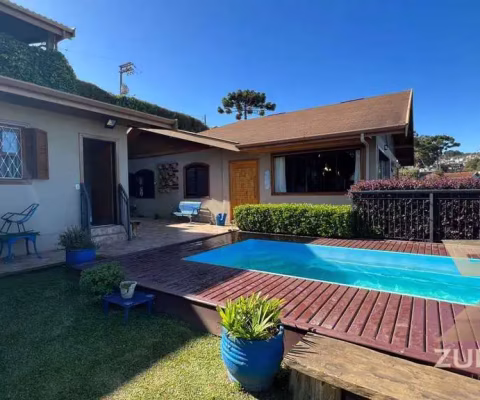 Casa com 4 dormitórios à venda, 244 m² por R$ 1.100.000,00 - Vila Telma - Campos do Jordão/SP