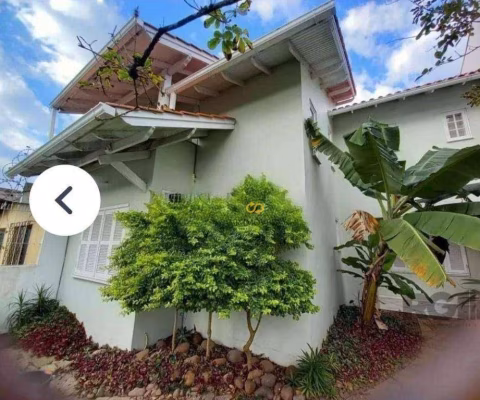 Casa com 4 dormitórios para alugar, 210 m² por R$ 6.000/mês - Jardim Itu Sabará - Porto Alegre/RS