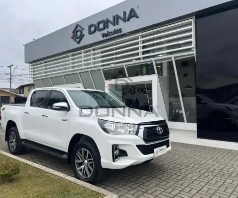 Toyota Hilux / CDSRVA4FD - Branca - 2019/2020