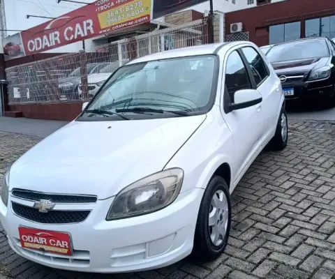 CELTA 1.0 COMPLETO:AIR BAG, ABS, ALARME, AR CONDICIONADO, AR QUENTE, DIREÇÃO HIDRÁULICA, TRAVAS ELÉT