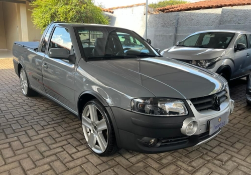 Carro Volkswagen Saveiro G4 Surf (Rebaixada com som/moto na capota