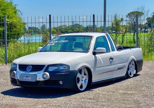 Carro Volkswagen Saveiro G4 Surf (Rebaixada com som/moto na capota