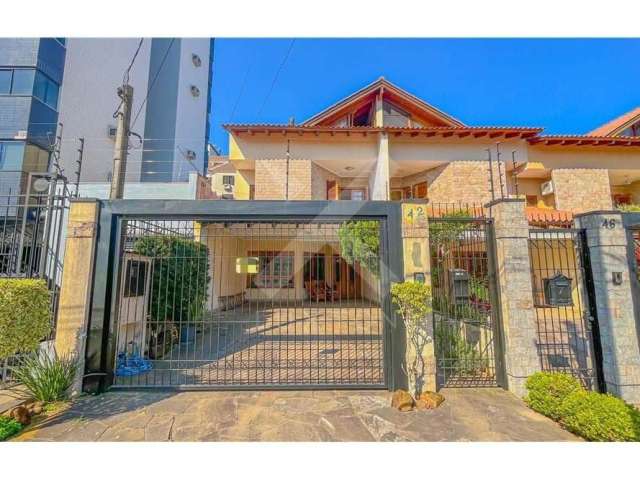 Casa com 3 quartos à venda na Rua Professor Isidoro La Porta, 42, Jardim Itu Sabará, Porto Alegre por R$ 1.075.000