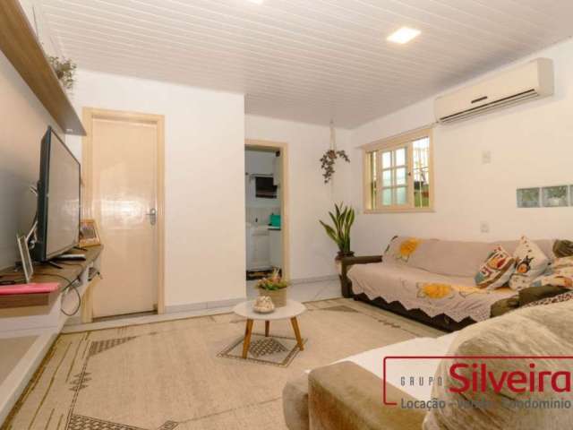 Casa com 3 quartos à venda na Rua Comandai, 350, Cristal, Porto Alegre por R$ 997.500