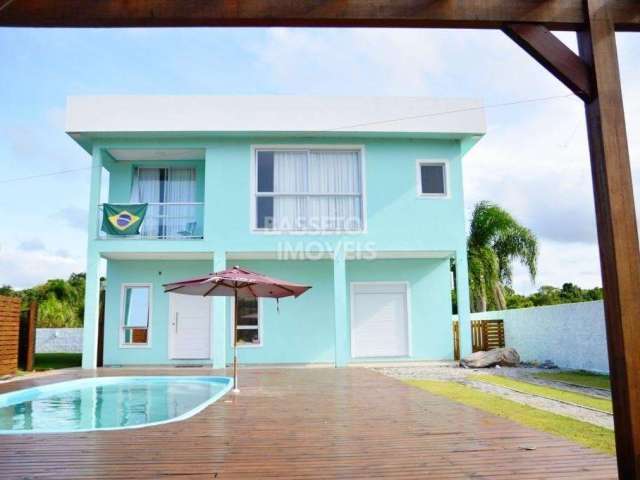 Casa em condomínio fechado com 5 quartos à venda na Rua do Lamim, 2221, Canasvieiras, Florianópolis por R$ 2.900.000