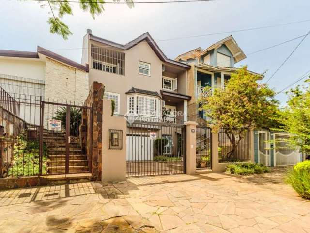 Casa com 3 quartos à venda na Rua João Berutti, 247, Chácara das Pedras, Porto Alegre, 302 m2 por R$ 2.100.000
