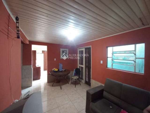 Casa com 2 quartos à venda na Rua Bento Silva Nunes, 340, Restinga, Porto Alegre, 180 m2 por R$ 265.000