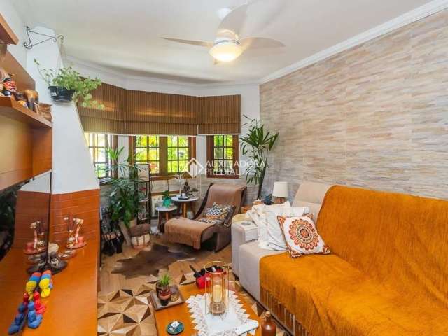 Casa em condomínio fechado com 3 quartos à venda na Rua Osório Mendes Ouriques, 332, Guarujá, Porto Alegre, 186 m2 por R$ 400.000