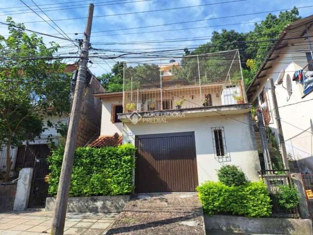 Casa com 3 quartos à venda na Rua Santiago Dantas, 398, Cascata, Porto Alegre, 160 m2 por R$ 299.000