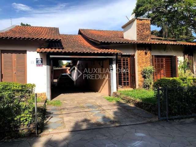 Casa em condomínio fechado com 4 quartos à venda na Rua Humberto de Campos, 68, Partenon, Porto Alegre, 464 m2 por R$ 499.900