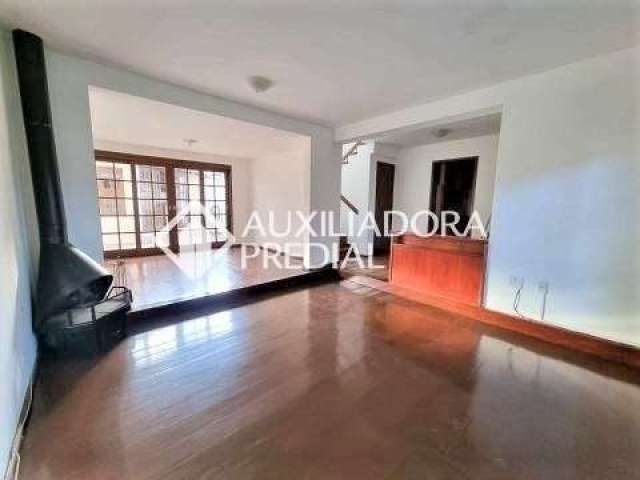 Casa em condomínio fechado com 3 quartos à venda na Rua Conrado Ferrari, 71, Jardim Isabel, Porto Alegre, 211 m2 por R$ 800.000