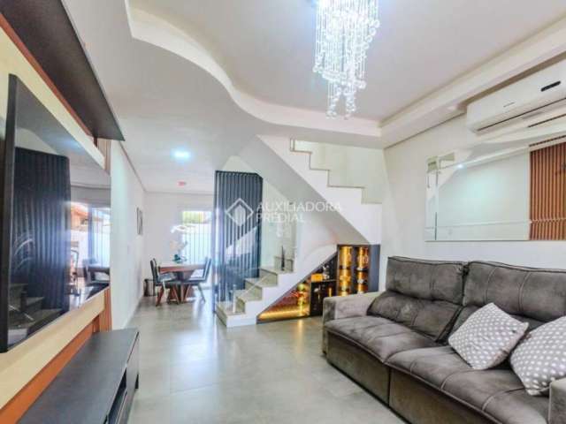 Casa em condomínio fechado com 2 quartos à venda na Rua Ivo Walter Kern, 10, Hípica, Porto Alegre, 93 m2 por R$ 499.000