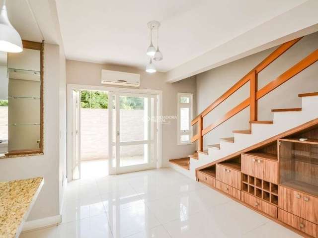 Casa em condomínio fechado com 3 quartos à venda na Rua Costa Lima, 564, Nonoai, Porto Alegre, 122 m2 por R$ 650.000