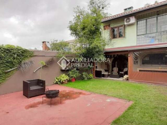 Casa com 3 quartos à venda na Rua Atlântida, 85, Ipanema, Porto Alegre, 330 m2 por R$ 1.115.000