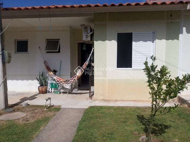 Casa em condomínio fechado com 2 quartos à venda na Jozino Liotti, 300, Jardim Algarve, Alvorada, 43 m2 por R$ 179.000