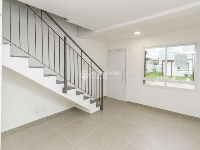 Casa em condomínio fechado com 2 quartos para alugar na Estrada Cristiano Kraemer, 5018, Vila Nova, Porto Alegre, 58 m2 por R$ 2.000