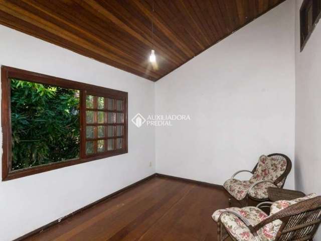 Casa em condomínio fechado com 3 quartos para alugar na Avenida América, 264, Auxiliadora, Porto Alegre, 200 m2 por R$ 4.500